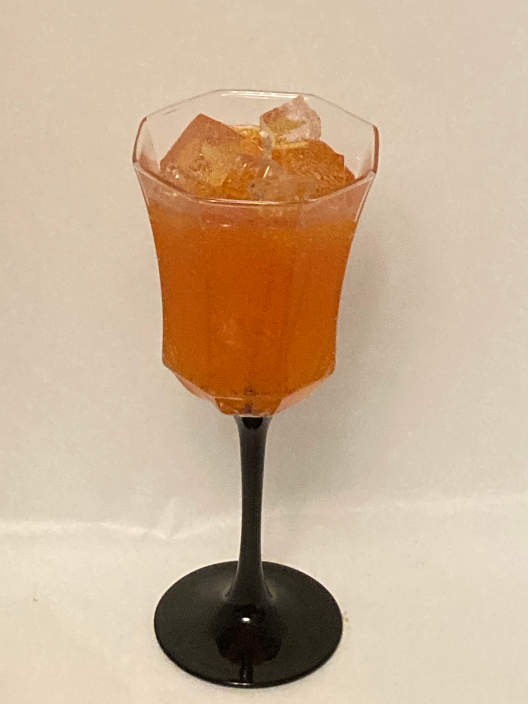 orange soda with ice candle